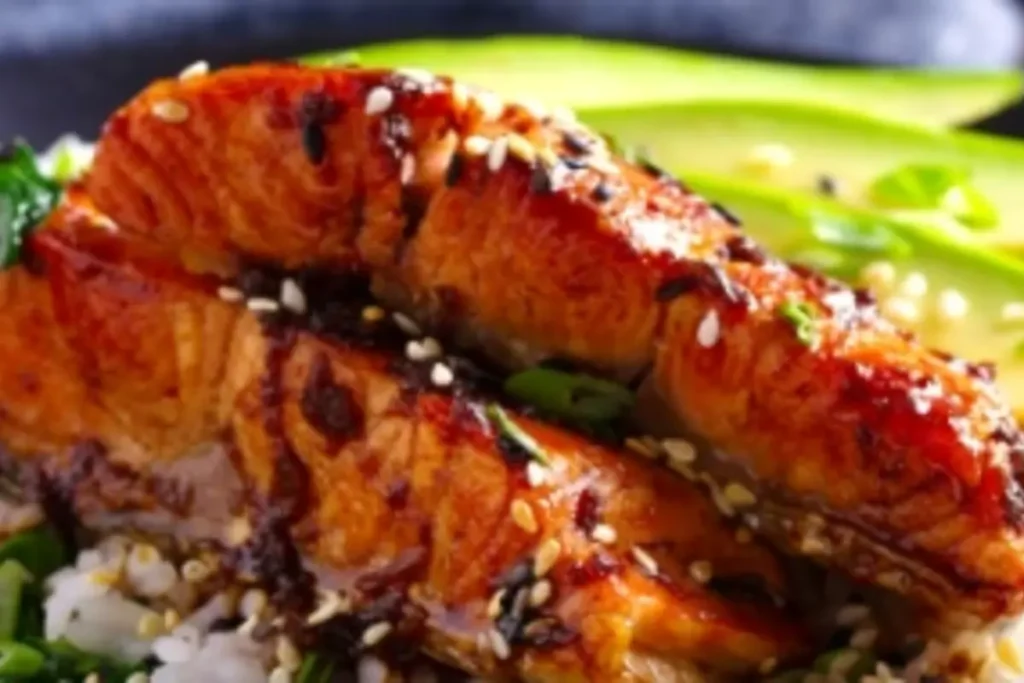 Salmon Belly Recipe served with rice and garnish.